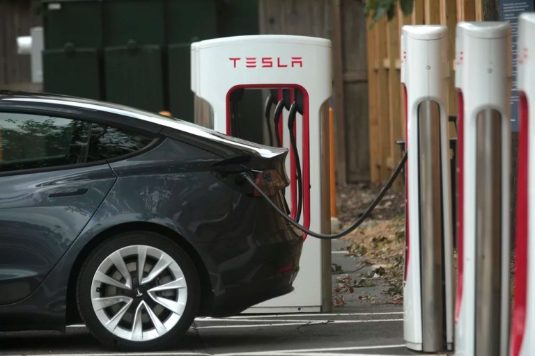 A Tesla supercharging location is seen on Kipling Street, June 3, 2024 in Houston. Charging stations have been hit particularly hard by thieves who likely want to sell the highly conductive copper wiring inside the cables at near-record prices. But authorities and charging company officials say similar thefts are increasing across the United States as more charging stations are built.