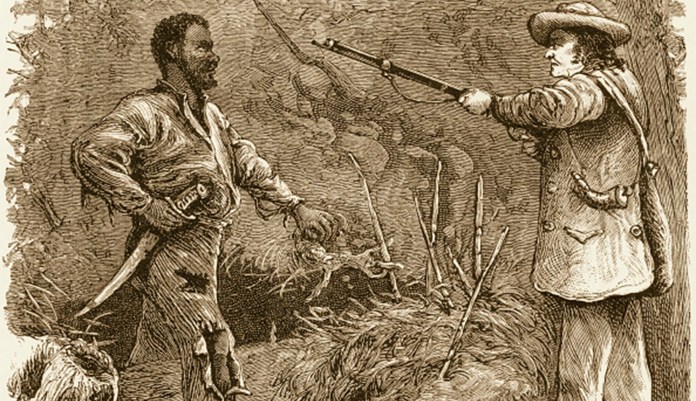 Nat Turner is shown being discovered in a wooded area of Virginia by a white man carrying a gun in 1831.