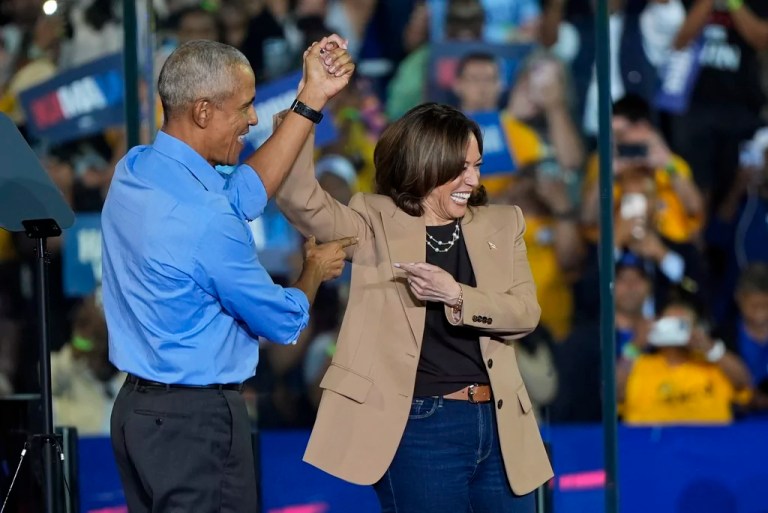 Former President Barrack Obama gestures to then-Democratic presidential nominee Vice President Kamala Harris after introducing her to speak during a campaign rally for Harris on Thursday, Oct. 24, 2024.