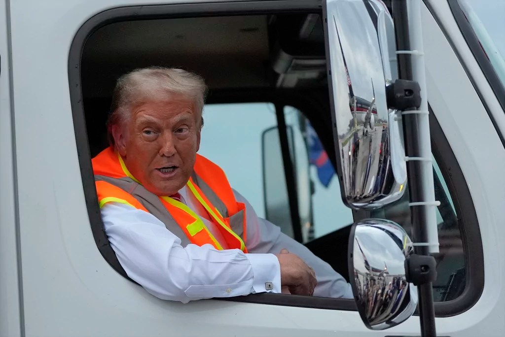 Trump shares story behind garbage truck and orange vest