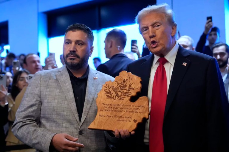 Trump courts Arab Americans with pledge for world peace in historic Dearborn visit