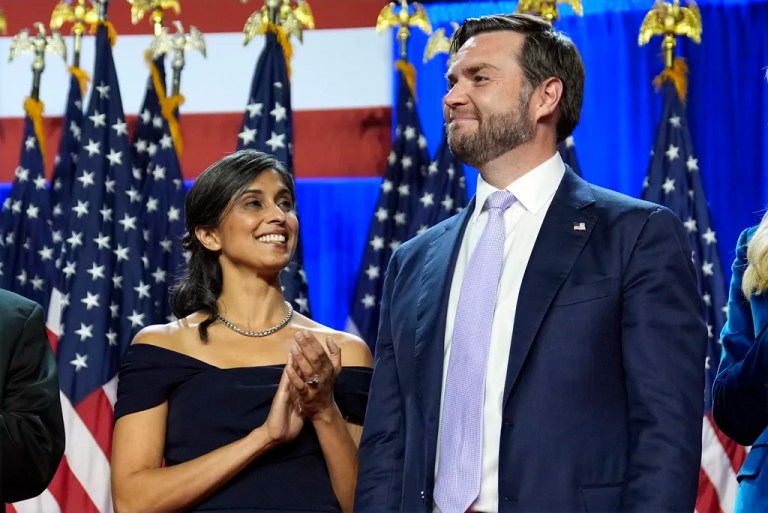 Vice President-elect Sen. J.D. Vance smiles as his wife Usha Vance applauds at an election night watch party at the Palm Beach Convention Center, Wednesday, Nov. 6, 2024, in West Palm Beach, Fla.