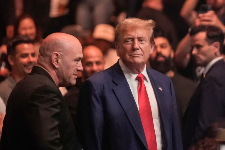 Donald Trump, right, talks to Dana White while attending the UFC 302 mixed martial arts event.