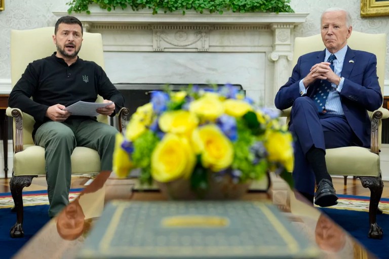 President Joe Biden listens as Ukrainian President Volodymyr Zelensky speaks during their meeting in the Oval Office of the White House in Washington, Sept. 26, 2024.