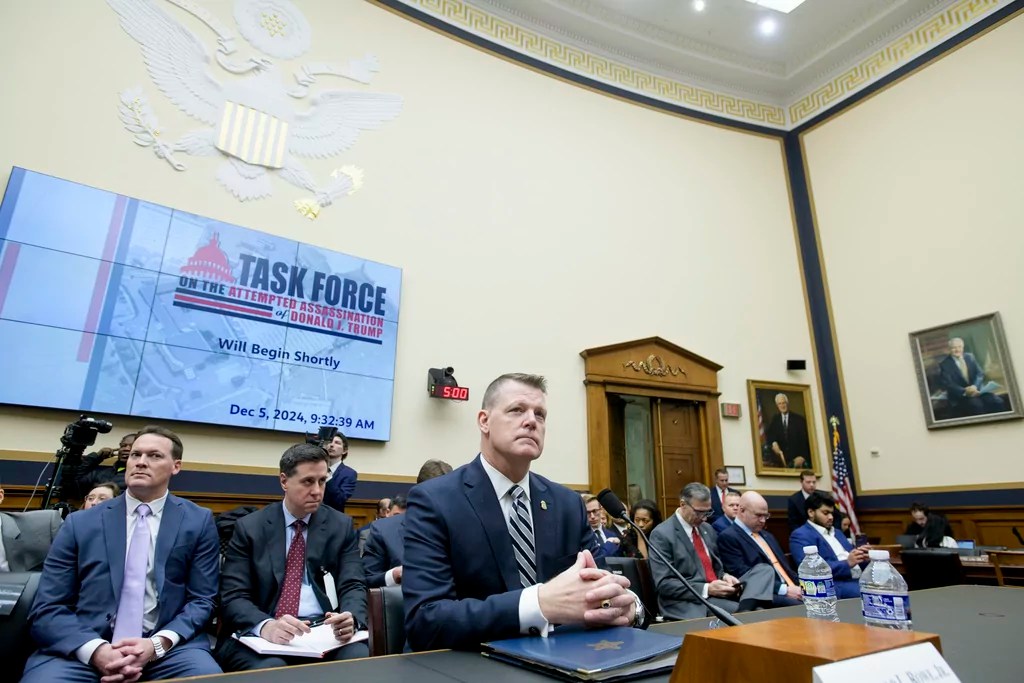 Secret Service Acting Director Ronald L. Rowe Jr. takes his seat before testifying during a House Task Force hearing on the Secret Service's security failures during the attempted assassinations of President-elect Donald Trump in Butler, Pa., on July 13, 2024, and West Palm Beach, Fla, on Sept. 15, 2024, on Capitol Hill, Thursday, Dec. 5, 2024, in Washington. (AP Photo/Rod Lamkey, Jr.)
