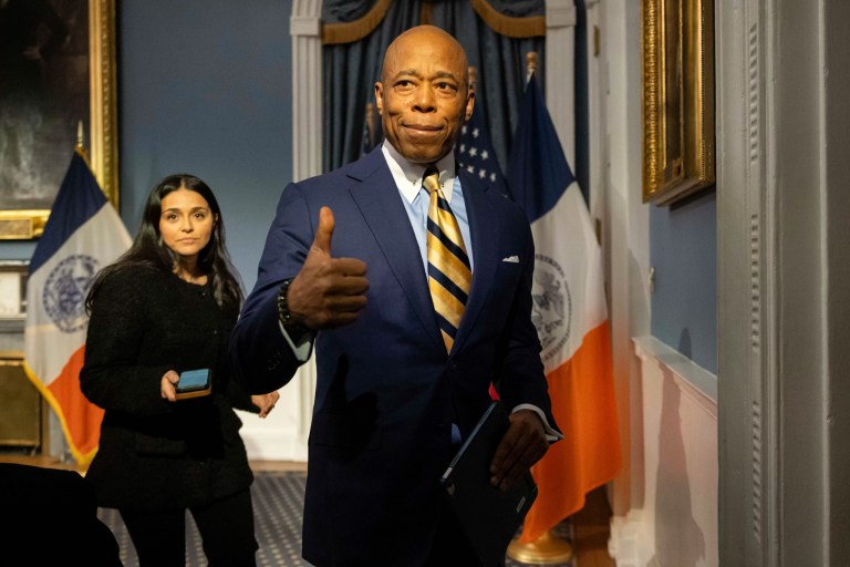 New York City Mayor Eric Adams gestures as he leaves a press conference at City Hall following meeting with President-elect Donald Trump’s incoming 