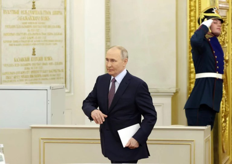 Russian President Vladimir Putin arrives at the Saint George's hall of the Grand Kremlin Palace during the State Council Meeting, December 20, 2024, in Moscow, Russia.