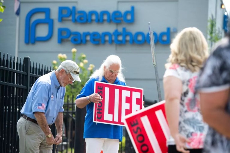 Anti-abortion demonstrators hold a protest outside the Planned Parenthood Reproductive Health Services Center in St. Louis, Missouri, May 31, 2019.