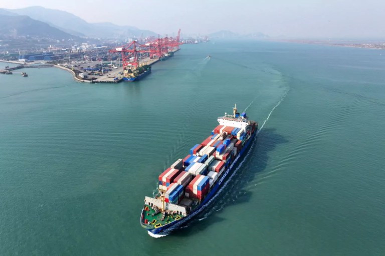 A container ship sails from the port at Lianyungang, in China's eastern Jiangsu province on December 10, 2024.