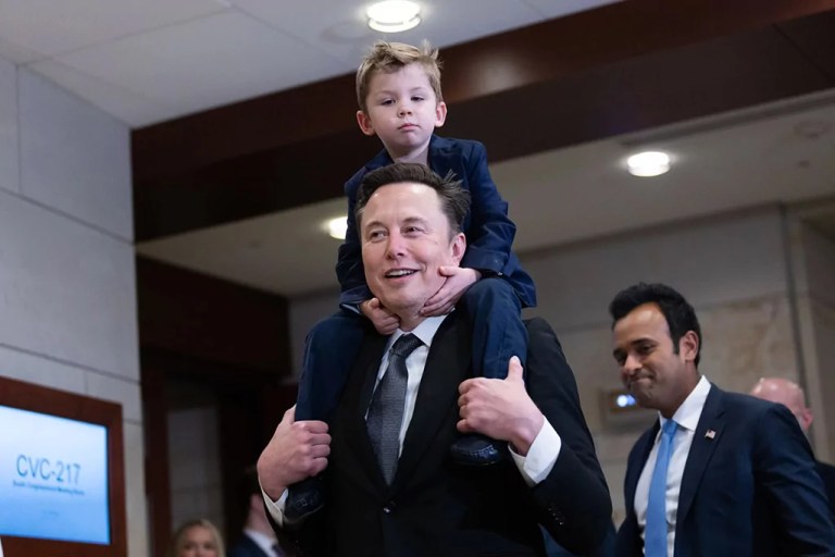 With his child present, Musk builds trust