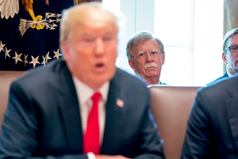 National security adviser John Bolton listens as President Donald Trump speaks during a cabinet meeting in the Cabinet Room of the White House, Thursday, Aug. 16, 2018, in Washington.