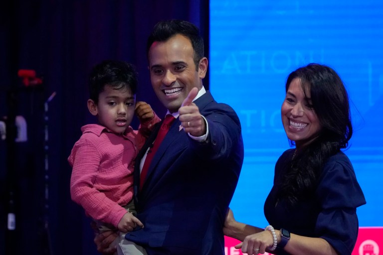 Republican presidential candidate businessman Vivek Ramaswamy with his wife Apoorva and son acknowledges supporters after a Republican presidential primary debate hosted by NewsNation on Wednesday, Dec. 6, 2023, at the Moody Music Hall at the University of Alabama in Tuscaloosa, Ala. (AP Photo/Gerald Herbert)