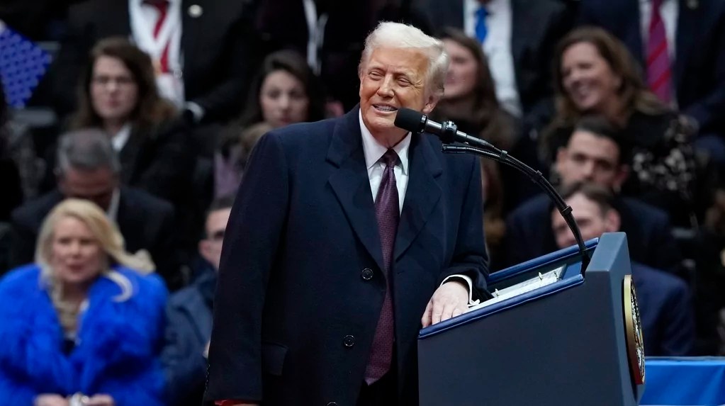 Trump signs first executive order in front of crowd, rescinding 78 Biden executive orders