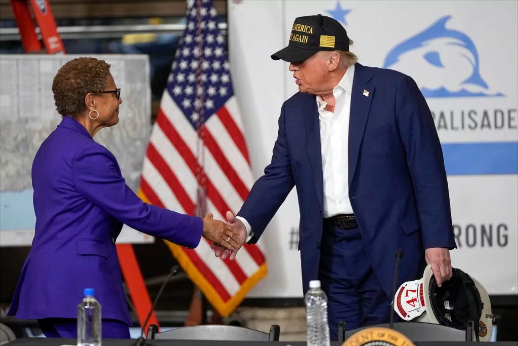President Donald Trump shakes hands with Los Angeles Mayor Karen Bass after a fire briefing in the Pacific Palisades neighborhood affected by recent wildfires in Los Angeles, Friday, Jan. 24, 2025. 