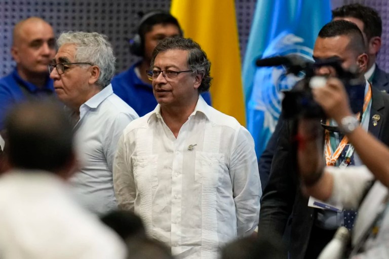 Colombian president plays humanitarian as deportees from US arrive