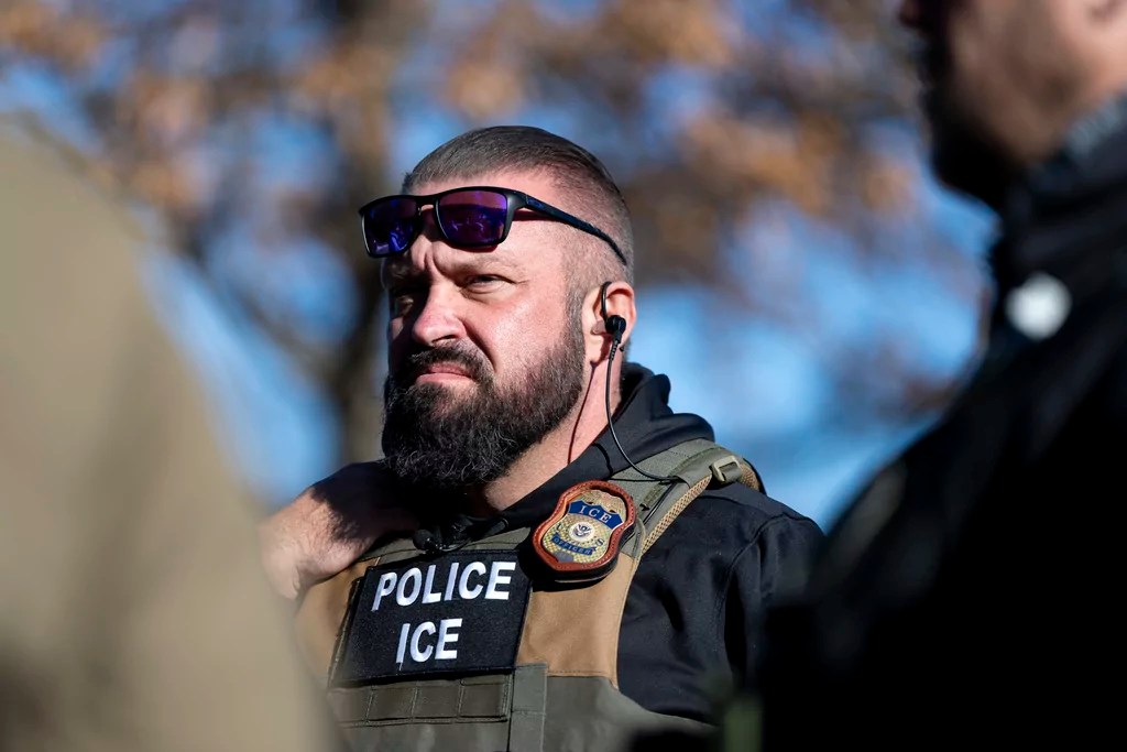 U.S. Immigration and Customs Enforcement Baltimore Field Officer director Matt Elliston listens during a briefing, Monday, Jan. 27, 2025, in Silver Spring, Md. 