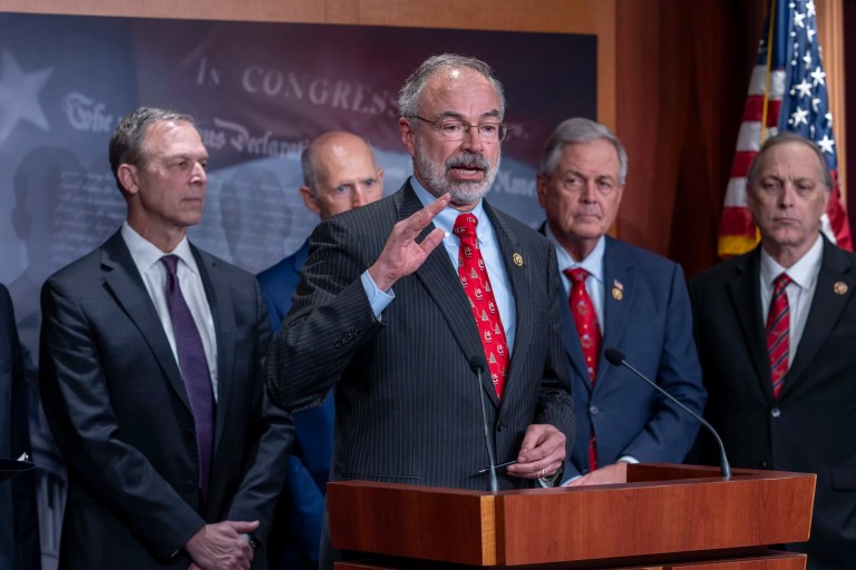 Rep. Andy Harris (R-MD), chairman of the House Freedom Caucus, joins a group of conservative Republicans to speak about the interim spending bill being crafted to avoid a shutdown of federal agencies, at the Capitol in Washington, Wednesday, Dec. 18, 2024.