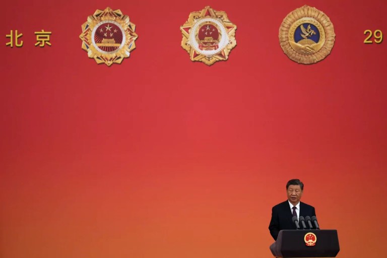 Chinese President Xi Jinping speaks after presenting national medals at a ceremony held in the Great Hall of the People in Beijing, Sunday, Sept. 29, 2024.