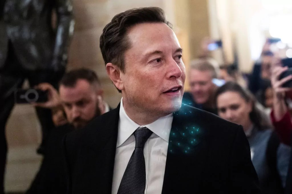 Elon Musk is seen in the Capitol after a meeting with Sen. John Thune (R-SD) while on Capitol Hill to talk about President-elect Donald Trump's Department of Government Efficiency, Thursday, Dec. 5, 2024.