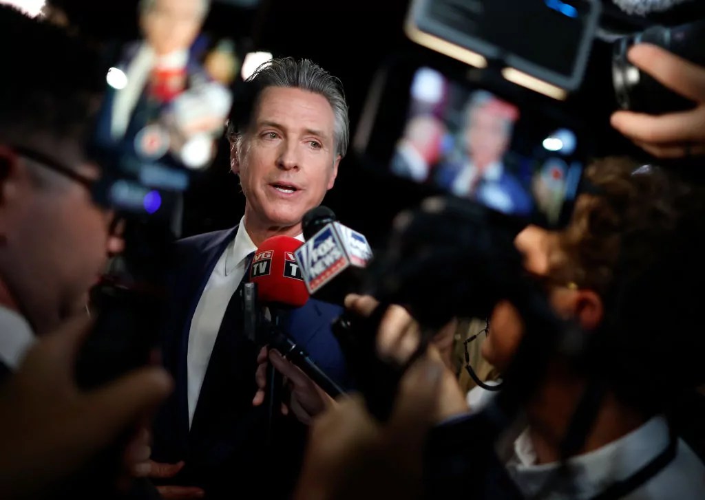 Governor of California Gavin Newsom speaks to reporters in the spin room following the presidential debate between Republican presidential nominee, former U.S. President Donald Trump and Democratic presidential nominee, U.S. Vice President Kamala Harris at The National Constitution Center on September 10, 2024 in Philadelphia, Pennsylvania.