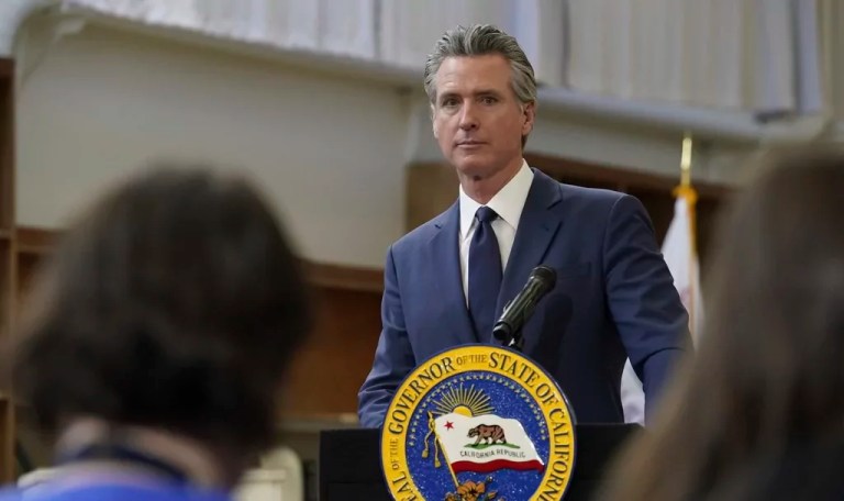 Gov. Gavin Newsom (D-CA) listens to a reporter's question as he outlines his proposed 2025 $322 billion state budget during a news conference at California State University, Stanislaus, in Turlock, California, Monday, Jan. 6, 2025.
