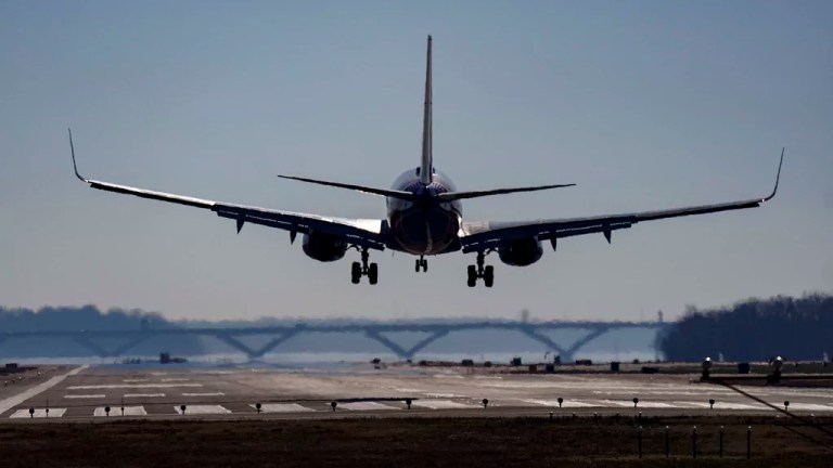 A Southwest plane lands at Ronald Reagan Washington National Airport in Arlington, Va., Dec. 30, 2022.
