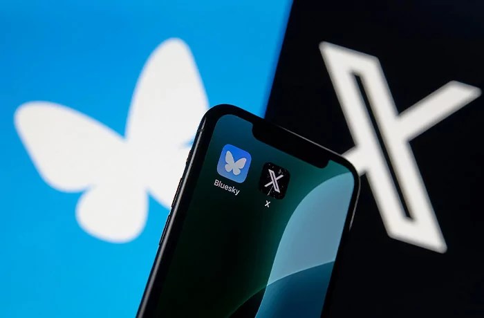 Icons of two rival social networks, X by Elon Musk and Bluesky founded by Jack Dorsey, are captured side by side.