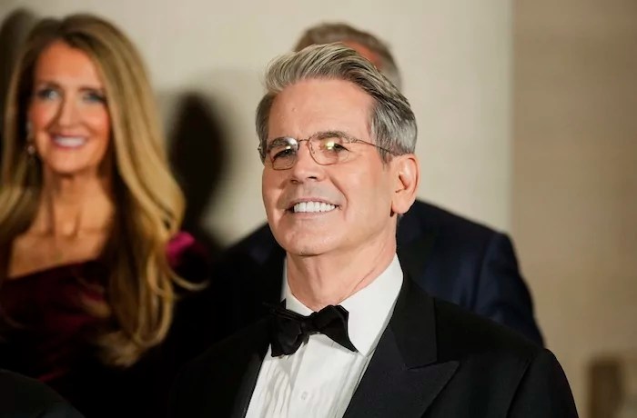 Scott Bessent, President-elect Donald Trump's choice to be Secretary of the Treasury, poses for a photo with Cabinet picks, other nominees and appointments, at the National Gallery of Art in Washington, Saturday, Jan. 18, 2025.