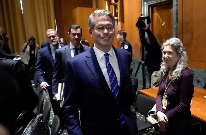 Scott Bessent, President-elect Donald Trump's choice to be Secretary of the Treasury, leaves after the Senate Finance Committee for his confirmation hearing, at the Capitol in Washington, Thursday, Jan. 16, 2025. 