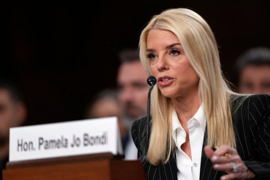 Pam Bondi, President-elect Donald Trump's choice to lead the Justice Department as attorney general, appears before the Senate Judiciary Committee for her confirmation hearing, at the Capitol in Washington, Wednesday, Jan. 15, 2025. 
