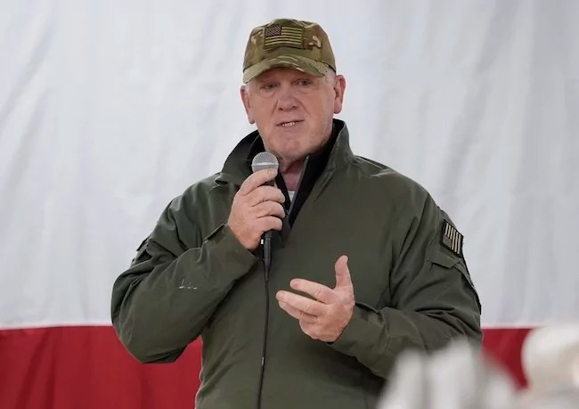 Incoming Border Czar Tom Homan talks to state troopers and national guardsmen taking part in Operation Lone Star at a facility on the U.S.-Mexico border, Nov. 26, 2024, in Eagle Pass, Texas.
