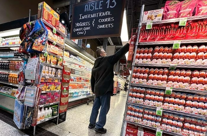 A customer shops at a grocery store in Wheeling, Illinois, Wednesday, Dec. 11, 2024.