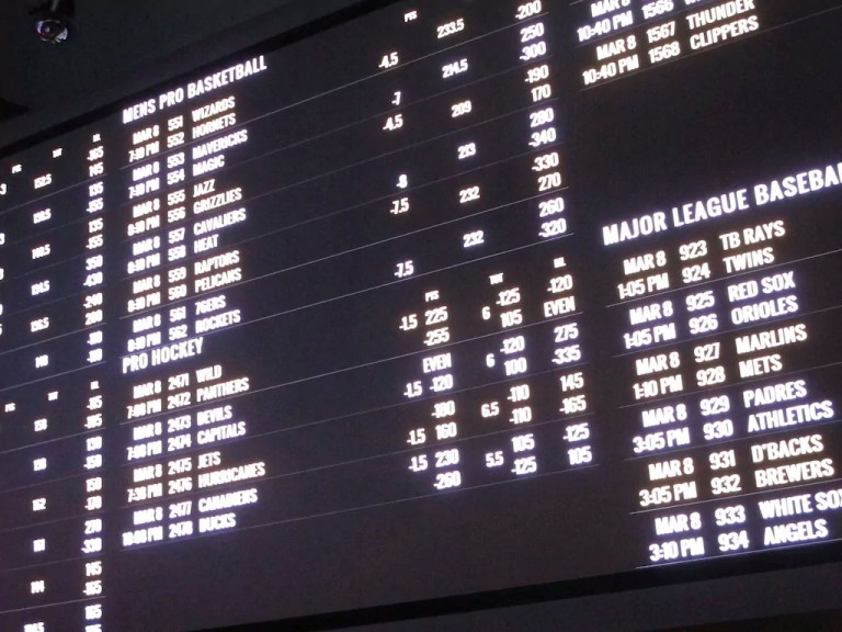 Odds for various sporting events are posted in a casino sports book in Atlantic City, New Jersey, March 8, 2019.