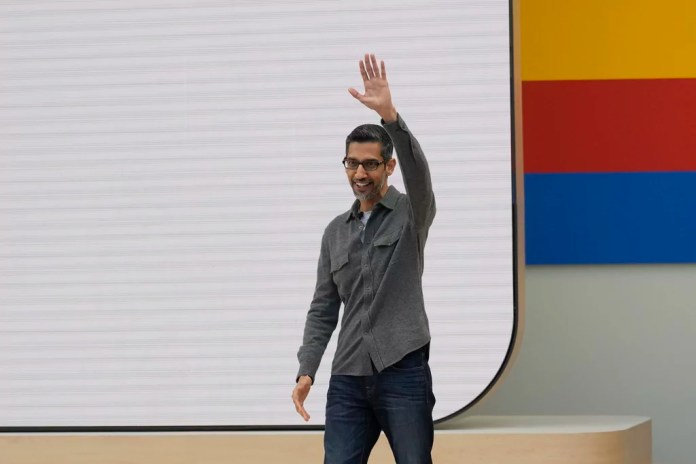 Alphabet CEO Sundar Pichai waves at a Google I/O event in Mountain View, California, Tuesday, May 14, 2024.