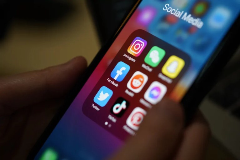 Social media applications on a smartphone screen.