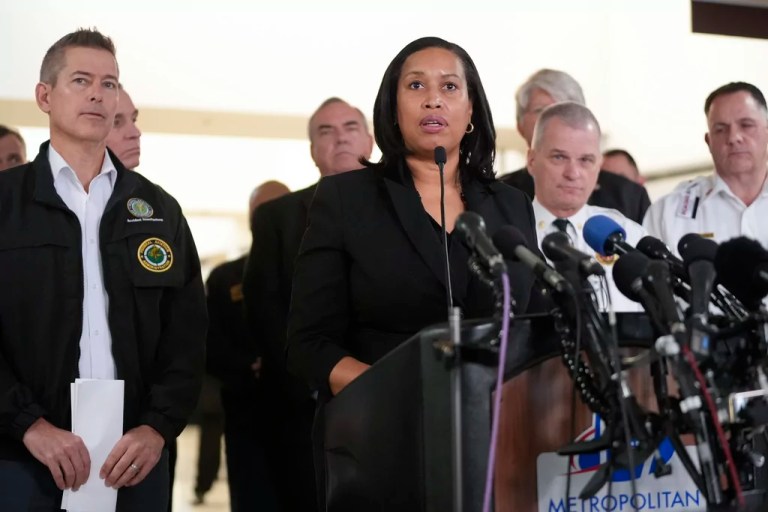 District of Columbia Mayor Muriel Bowser, with Transportation Secretary Sean Duffy, left, and other officials, speaks during a news conference at Ronald Reagan Washington National Airport, Thursday morning, Jan. 30, 2025, in Arlington, Va. (AP Photo/Mark Schiefelbein)