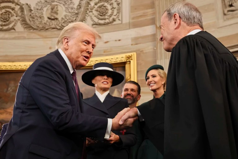 President Donald Trump shakes hands with Supreme Court Chief Justice John Roberts after being sworn in as president during the 60th presidential inauguration in the Capitol Rotunda in Washington, Monday, Jan. 20, 2025.