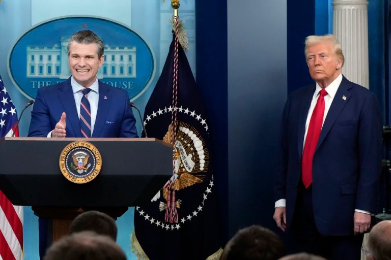 President Donald Trump listens as Defense Secretary Pete Hegseth speaks in the James Brady Press Briefing Room at the White House, Thursday, Jan. 30, 2025, in Washington.