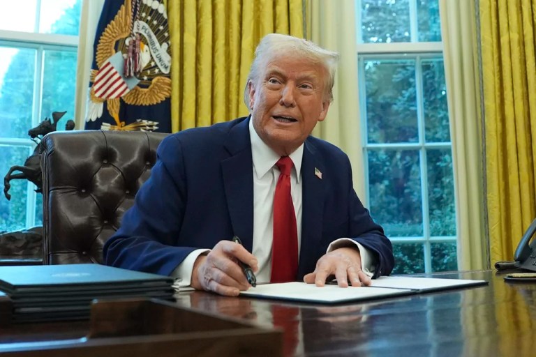 President Donald Trump speaks as he signs an executive order in the Oval Office of the White House, Monday, Feb. 3, 2025, in Washington.
