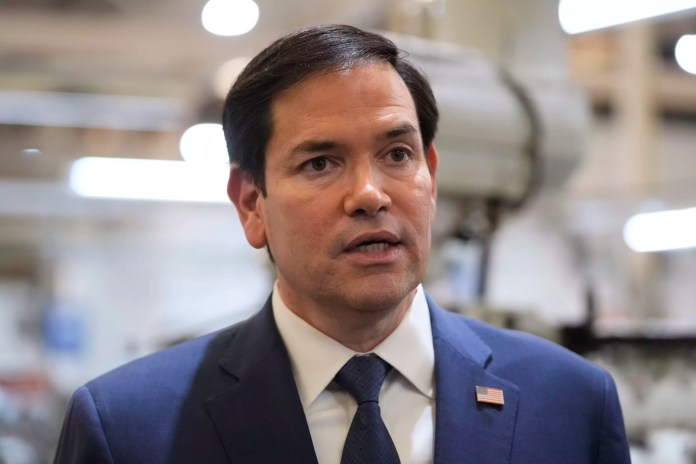Secretary of State Marco Rubio speaks to the media during a visit to aircraft maintenance firm Aeroman in San Luis Talpa, El Salvador, Monday, Feb. 3, 2025.