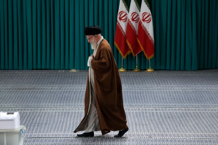 Iranian Supreme Leader Ayatollah Ali Khamenei arrives to vote for the parliamentary runoff elections, in Tehran, Iran, Friday, May 10, 2024.