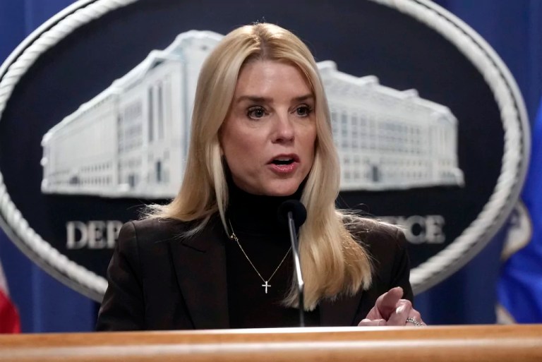 Attorney General Pam Bondi speaks at a news conference regarding immigration enforcement at the Justice Department, Wednesday, Feb. 12, 2025, in Washington. (AP Photo/Ben Curtis)