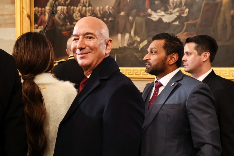 Amazon founder Jeff Bezos and Kash Patel, FBI director nominee, look on after the 60th presidential inauguration in the Capitol Rotunda in Washington, Monday, Jan. 20, 2025