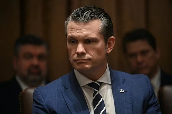 US Secretary of Defense Pete Hegseth looks on as US President Donald Trump holds a cabinet meeting at the White House in Washington, DC, on February 26, 2025.