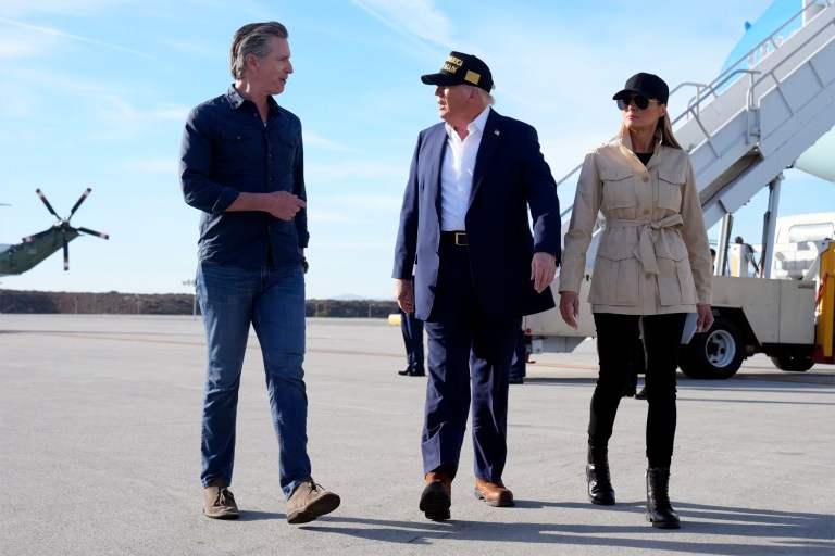 President Donald Trump and first lady Melania Trump walk with Gov. Gavin Newsom (D-CA) after arriving on Air Force One at Los Angeles International Airport in Los Angeles, Jan. 24, 2025.