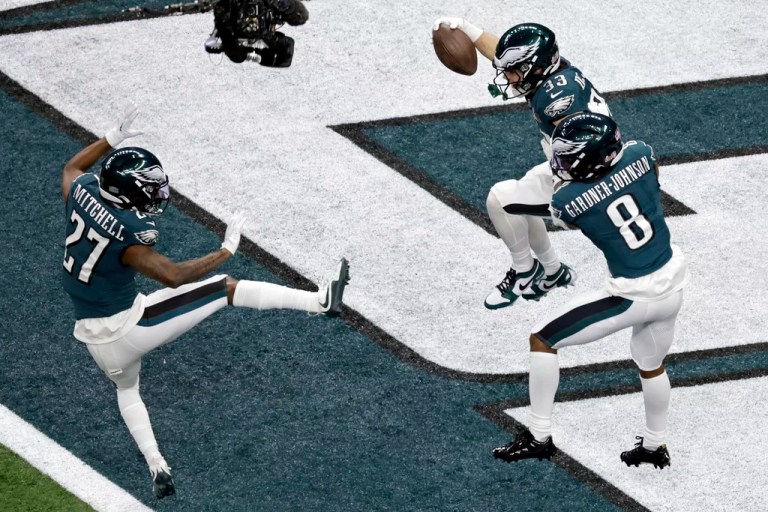 Philadelphia Eagles cornerback Cooper DeJean (33) celebrates returning an interception for a touchdown during the NFL Super Bowl 59 football game against the Kansas City Chiefs Sunday, Feb. 9, 2025, in New Orleans. The Eagles won 40-22.