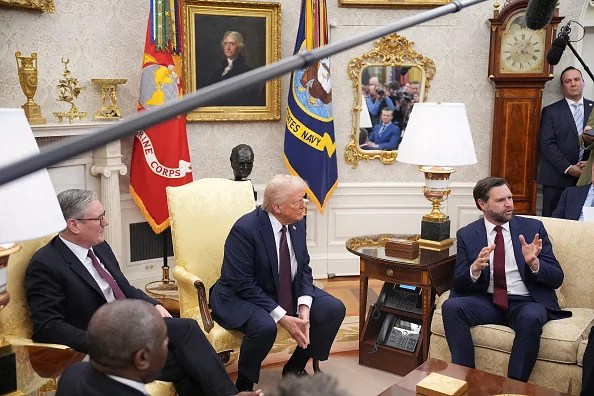 U.S. President Donald Trump, center, and Vice President JD Vance, right, meet with British Prime Minister Keir Starmer in the Oval Office at the White House, Feb. 27, 2025, in Washington, D.C.