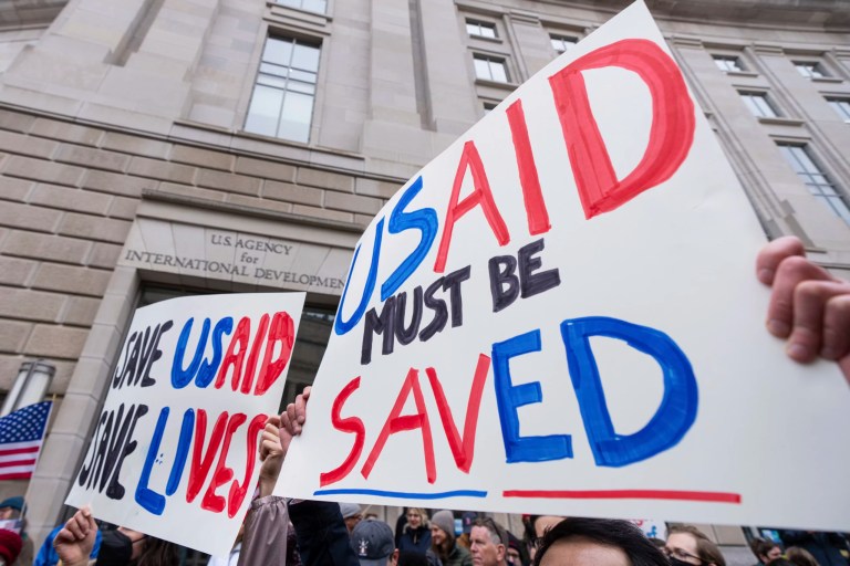Employees and supporters protest outside the headquarters of the U.S. Agency for International Development, Monday, Feb. 3, 2025, after Elon Musk posted on social media that he and President Donald Trump would shut down the agency.