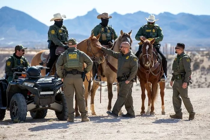 Border Patrol agents wait for the arrival of Defense Secretary Pete Hegseth for a visit to the U.S.-Mexico border in Sunland Park, New Mexico, Monday, Feb. 3, 2025.