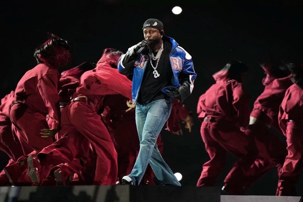 Super Bowl halftime cast member banned for life for unfurling flag mid-performance